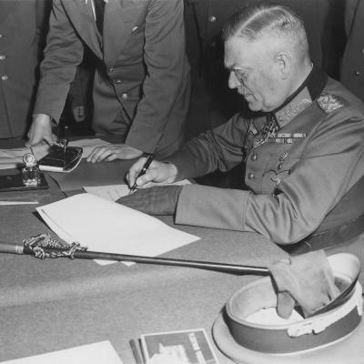 CHRDLyon_Field_Marshall_Keitel_signs_German_surrender_terms